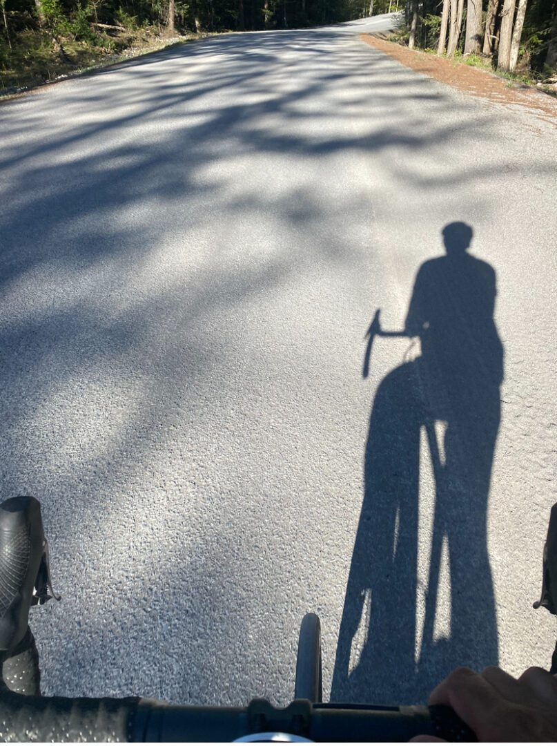 A person riding a bike on the road